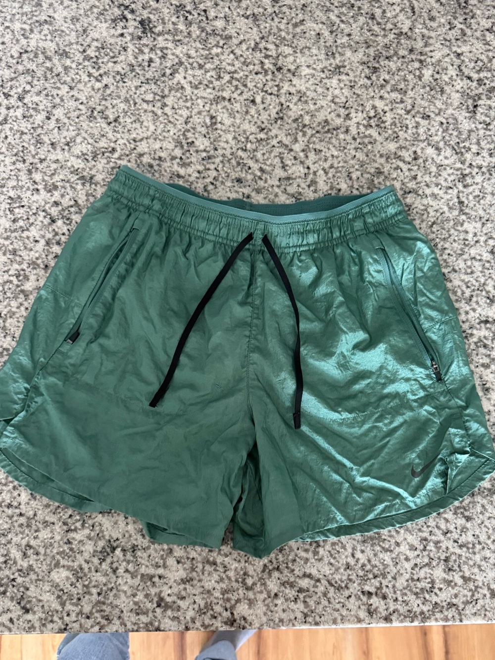 Nike Men's Green Athletic Shorts with Black Drawstrings